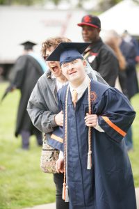 InclusiveU students and family at graduation