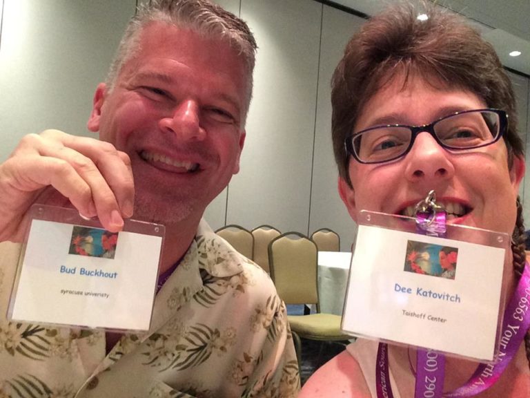 Bud Buckhout and Dee Katovitch selfie holding their conference nametags